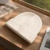 The off-white knitted cap is warm and slimming. The autumn and winter woolen cap is versatile for women's casual wear details Picture
